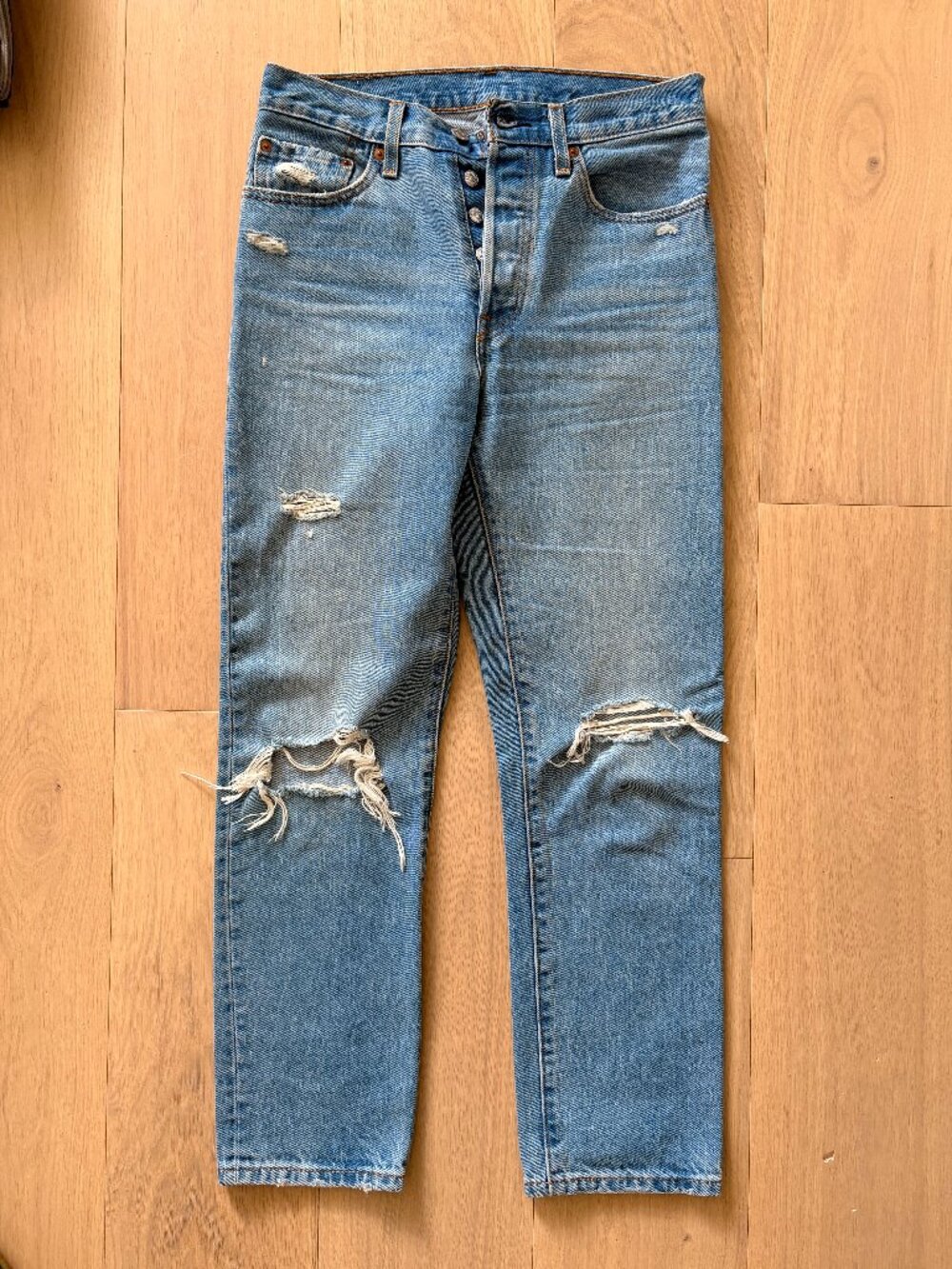 Levi's 501 distressed jeans